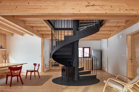 This Ski Cabin’s Spiral Stair Doubles as... a Woodburning Stove?