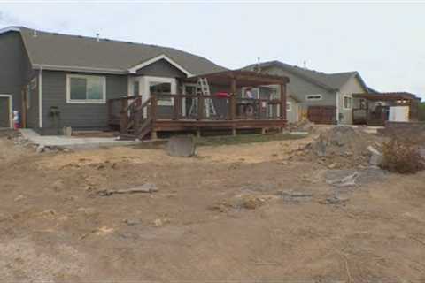 Homeowners forced to move after builders fill in retention pond, build house on top