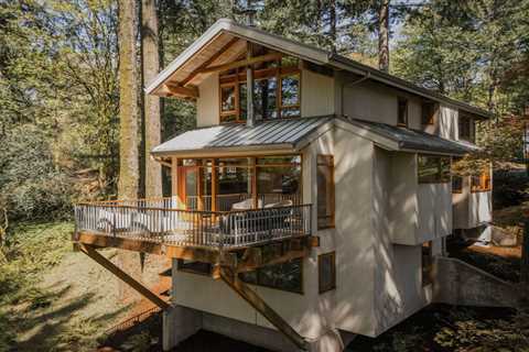 This $1.3M Portland Chalet Cantilevers Over a Wooded Hillside