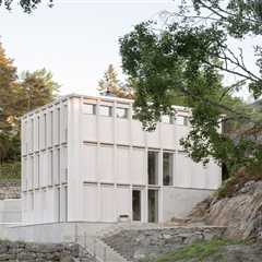Why Does This Swedish Home Look So Crisp? The Wood Cladding Doesn’t Have Any Knots