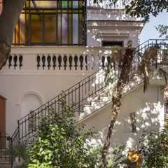 A Glass-Floor Mezzanine Shatters Conventions in This Reworked Rome Apartment