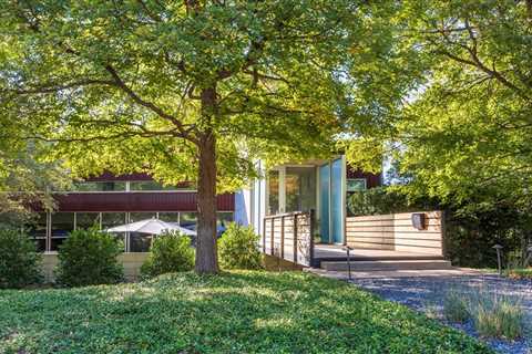 Cross the Bridge to Enter This $1.4M Dallas Home Wrapped in Cor-Ten Steel