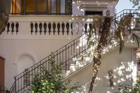 A Glass-Floor Mezzanine Shatters Conventions in This Reworked Rome Apartment