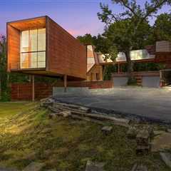 A Bridge Connects the Wings of This Wild $1.3M Home in Nebraska