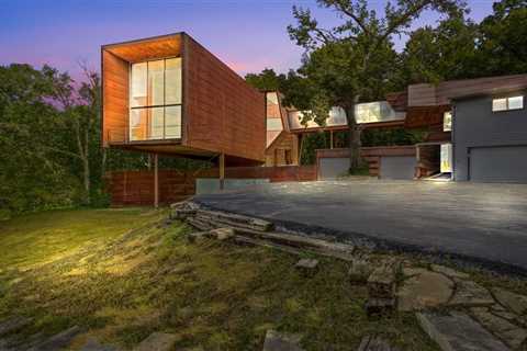 A Bridge Connects the Wings of This Wild $1.3M Home in Nebraska