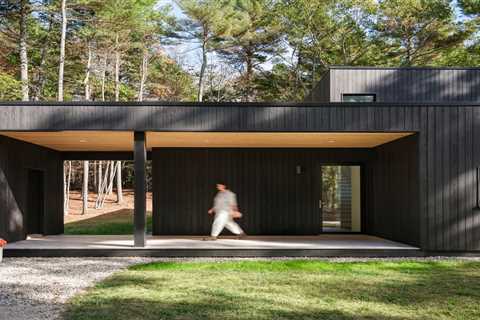 This Blackened Cedar Home Was Designed to Vanish Into the Trees—Almost